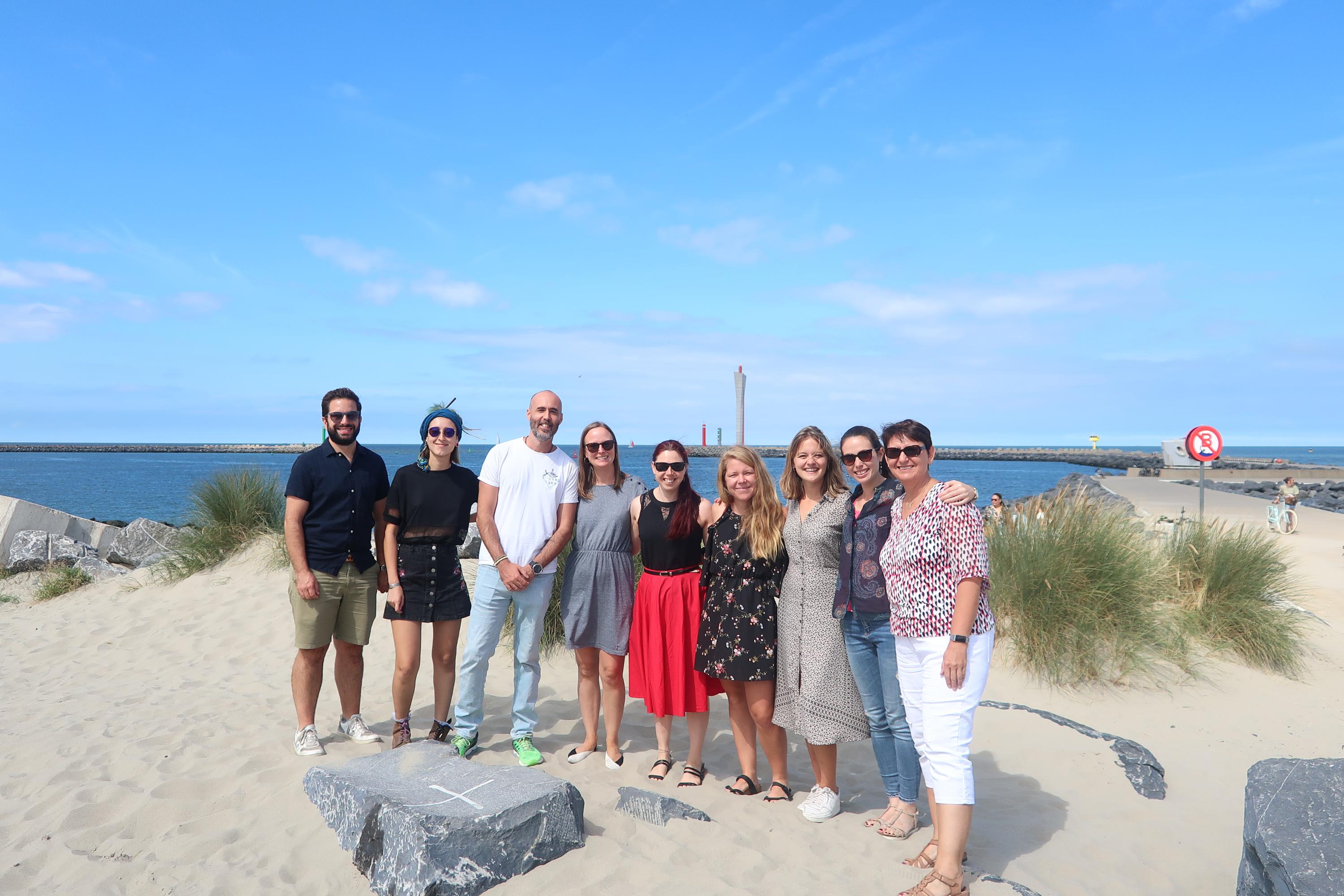 EMB Ambassadors and Secretariat pose at the beach in Ostend